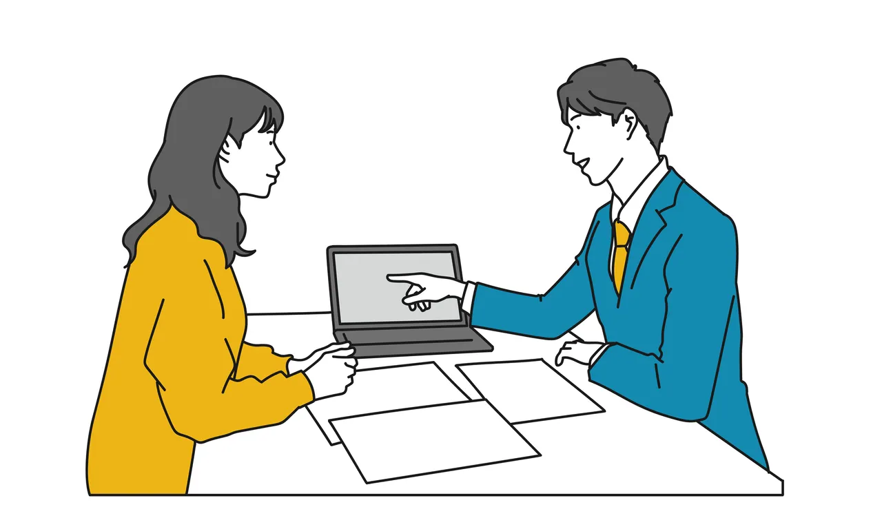 ホームページ制作会社と打ち合わせをする経営者